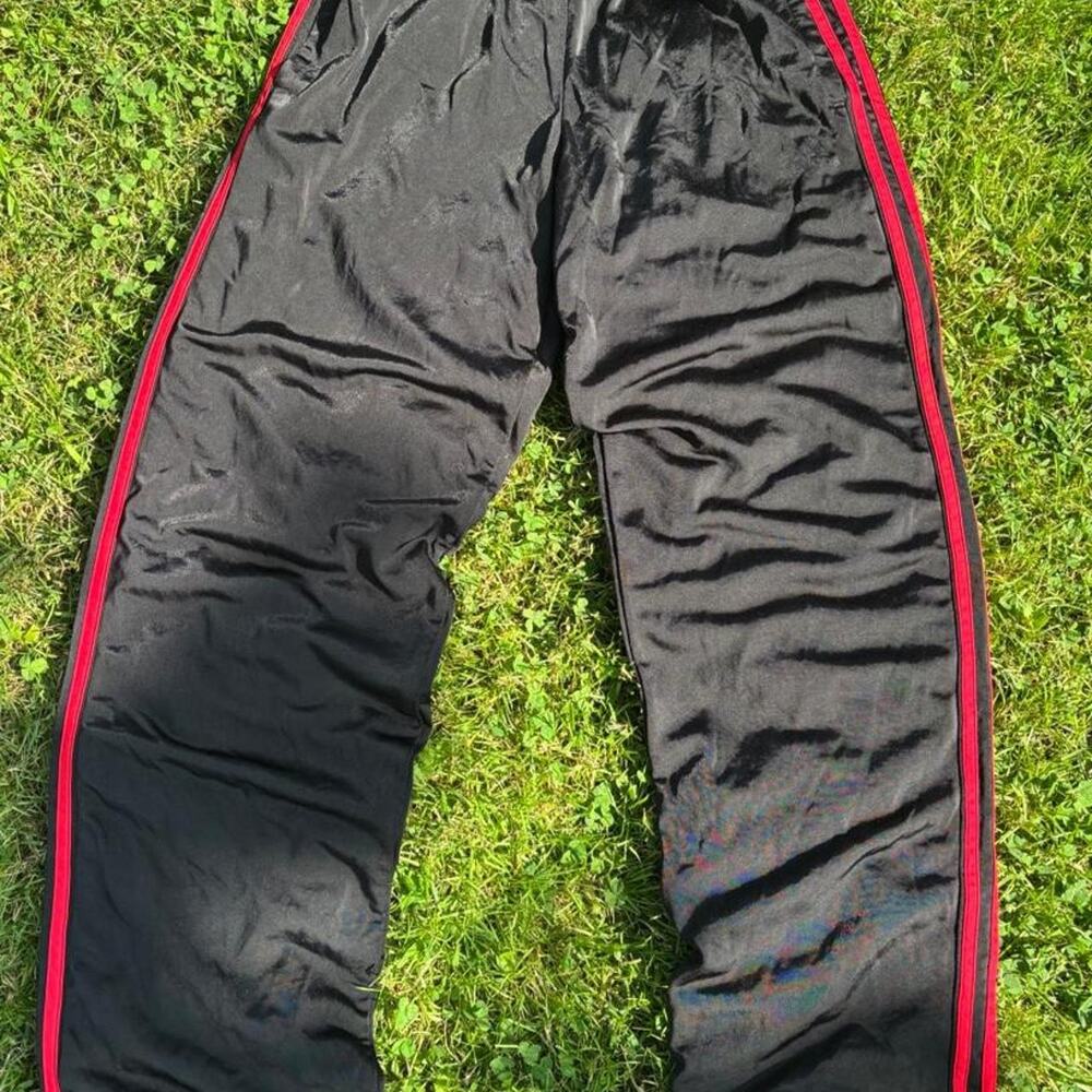 Adidas black track pants with